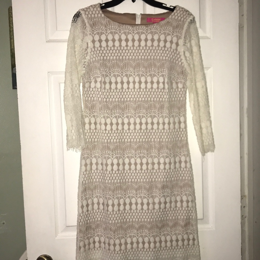 Beautiful off-white knee length dress, worn once.